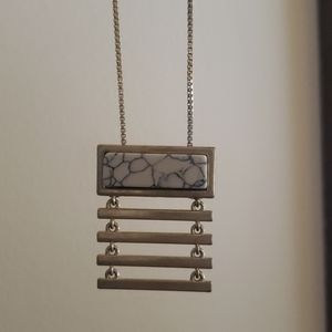 Long gold necklace